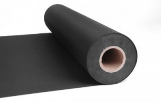 Black Rubber Sheet Roll That Is Starting To Unroll